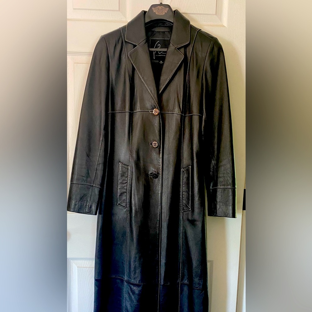 Venus Williams long leather coat.